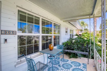 Charming Waterside Retreat with Enclosed Florida Room