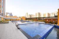 FabHotel Prime Spectrum Metro - with Pool |  5 Mins Walk from Sector 75 Metro - ที่มีสระว่ายน้ำ
