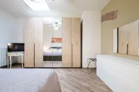 House under the Tower by Studio Vita - Condos