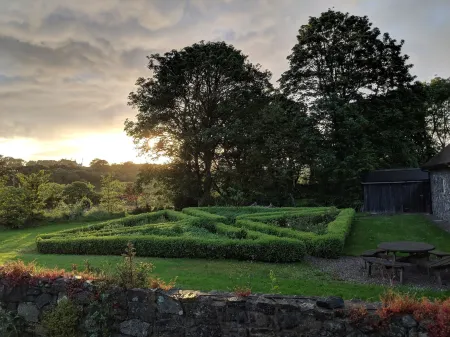 The Old Bushmills Barn Отели рядом с достопримечательностью «Замок Данлюс»