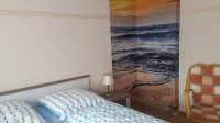 Familienurlaub in Ostfriesland für Max 7 Pers in 2 Wohnungen, Auch Einzeln Wohnungen Hotels in Esens