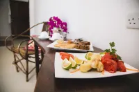 Moonshine Uroa Boutique Hotel - breakfast
