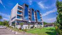 Modern Place Jeju Отели рядом с достопримечательностью «Камелия- Хилл»