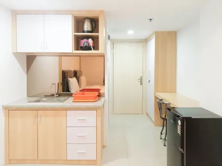 Cozy Studio Room at de Prima Apartment Отели в г. Sei Putih Tengah