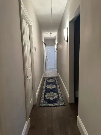 Spacious, Cozy, near T station -Private Parking -Free Wifi -Washer & Dryer - AC