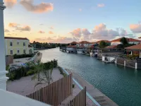 Private condo, water views, great breezes, well appointed for divers