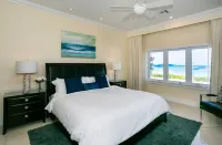 Prime Residence #6 on 7 Mile Beach, High-End Ground Floor Beachfront Condo