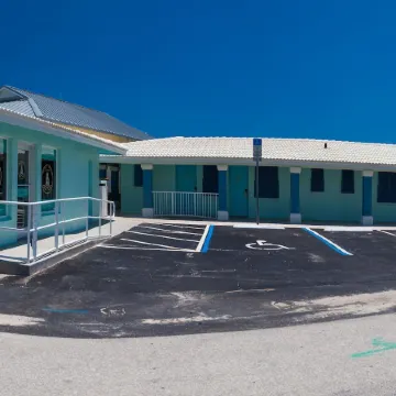 The Salty Mermaid Oceanfront Hotel