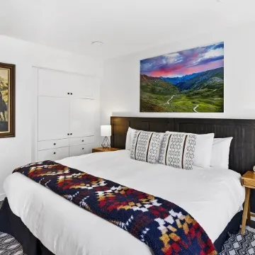 Top Floor Condo with Balcony Steps to Lifts & Main Street 2 Bedroom Condo by RedAwning