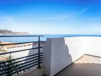 Architect-designed villa with panoramic view of the Revellata