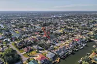 4-bedroom waterfront vacation home 14 minutes from State Parks and beaches.