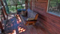 Cozy cedar/rock cabin & bunkhouse with private access to the Frio River.