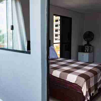 Suíte Independente a 200m Praia Indaiá - 01 Suíte em Caraguatatuba Rooms