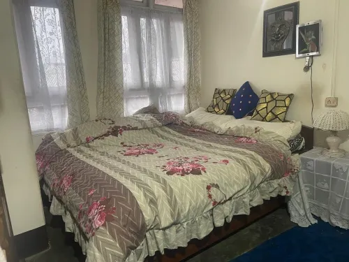 The apartment is a 2 bedroom, 1 living room, 1 bathroom with kitchen.