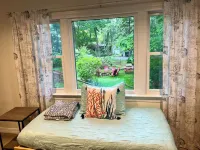 Large Outdoor Space with Saltwater Hot Tub, Fire Pit, Gardens, and Deck in OOB!