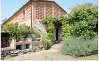 Tuscan village in SIena. farmhouse surrounded by garden,pool and panoramic view