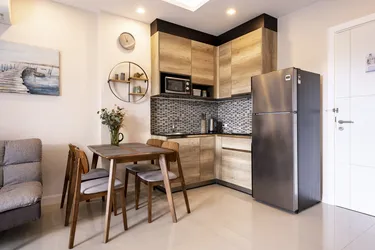 รูปภาพของCozy 1BR Retreat Kitchen & Free Wi-Fi 103