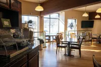 Express Suites Riverport Inn & Suites - petit déjeuner