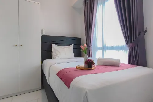 Spacious and Cozy 2BR at Tamansari Prospero Sidoarjo Apartment By Travelio