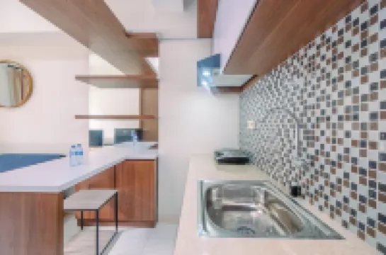 Cozy Stay 2BR Podomoro Golf View Apartment By Travelio Hotels in Gunung Putri