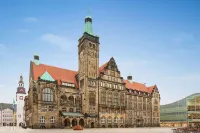 溫德姆開姆尼斯速8飯店 Besucherbergwerk Felsendome Rabenstein附近的飯店