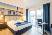 Familien- Und Aparthotel Strandhof Hotel di Tossens
