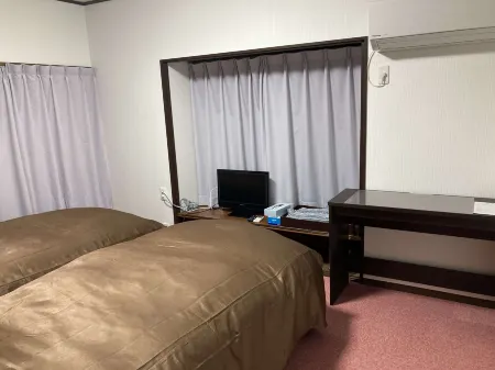 Seaside Inn Kiraku Отели рядом со станцией JR Tateyama station