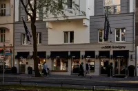Sir Savigny Hotel, Part of Sircle Collection Hotel in zona Bucherbogen