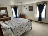 Rural cozy and quaint farmhouse with secluded patio and 15 minute drive to town. - 2-Star