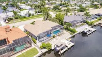 Luxury Waterfront Villa with Kayaks, Fishing, Bikes, Heated Pool, Fire Pit