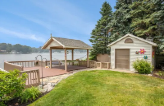 Private lakefront home. Sandy beach canoe, 2 kayaks. Pool, Spa & Pontoon rental.