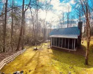 Charming and modernized 1800's Creekside Cabin w/Hot Tub and 5 minutes to I-77