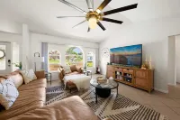 Tropical Oasis sleeps 13 with a heated pool.  Free WiFi.  Close to everything