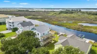 Soundfront, private dock, neighborhood pool, beach access, and tennis, Sunsets