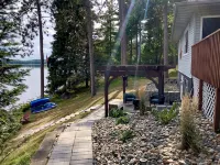 Relax in a cozy and private lake front cabin with breathtaking views!