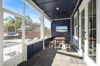 8 Bedrooms / 8.5 Baths / Sleeps 22 / Pool / 7 Parking Spots / Walk to the Beach!