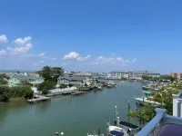 New cozy beach townhome with boat dock. Amazing 2 block proximity to the beach.