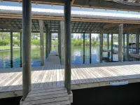 Luxury 4BR @ The Osprey, Steps To Beach, Pool, Private Boat Slip on Cotton Bayou