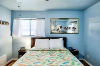 Charming private home - 2 miles to beach - heated saltwater pool & spa!