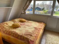 Vacation home close to the beach with patio cover; fiberglass; garden; parking at the house