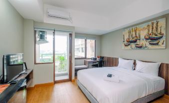 Comfortable Pool View Studio Room at Gateway Park LRT City Bekasi Apartment