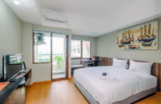 Comfortable Pool View Studio Room at LRT City Jatibening Apartment