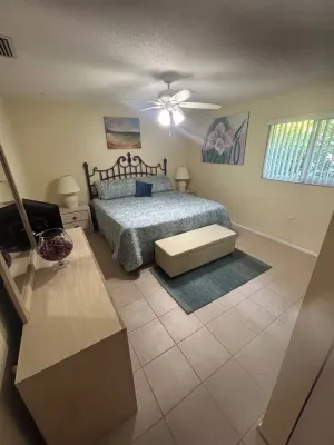Beautiful waterfront condo with a boat dock, pool, and across from the beach