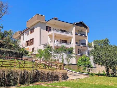 Hillsgate EXPERIENCE Отели в г. Кизериан