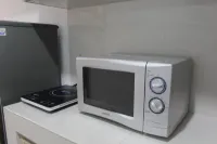 Bright Studio Apartment at Springwood Residence