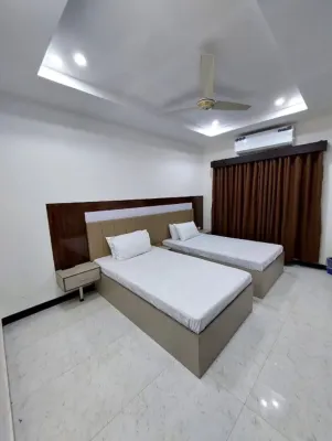 Overseas Hotel and Suites Отели в г. 