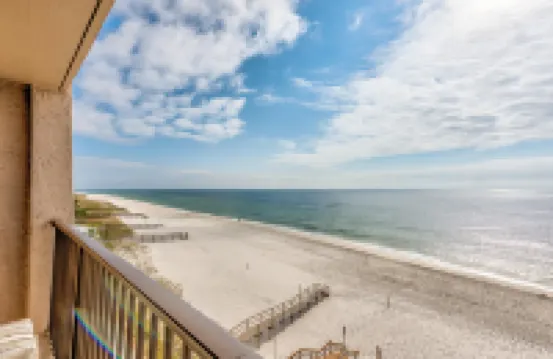 Beachfront condo with gulf/water views, central AC, balcony, W/D, & WiFi