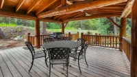 Spacious Deck by Year-Round Creek - Charming Blue River Cabin