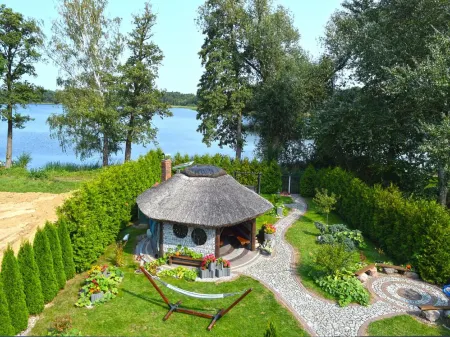 Holiday Home by Lake in Nowa Wioska Отели в г. Свебодзинский повят