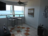 Breezy Beachfront Apt. View of Paradise Hotels in Zarzal